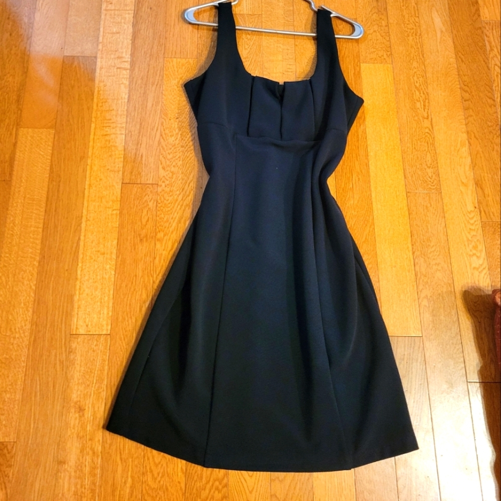 Tiana B. Little Black Dress. Stretch to body shape. Bust ruch like accent.